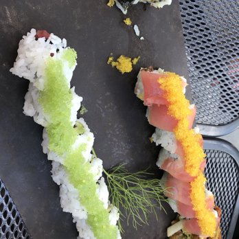 INDAH SUSHI - Left roll: Ahi Jewel topped with wasabi infused roe Right roll: Paddlefish+soft-shelled crab topped with citrus infused roe - Sushi Bars Near Me - Whitefish, Montana