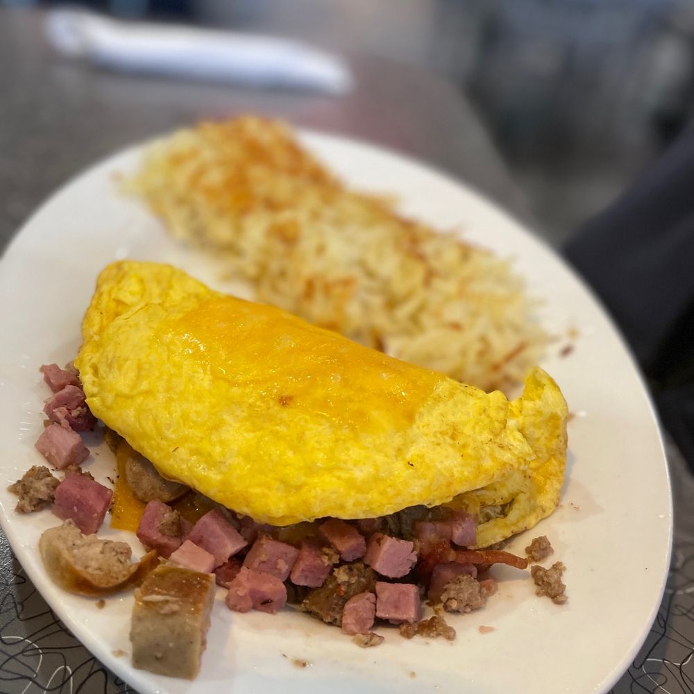 Biscuits Cafe - Meat lovers omelette with hashbrowns - Breakfast & Brunch Near Me - Phoenix, Arizona Biscuits Cafe - Meat lovers omelette with hashbrowns - Breakfast & Brunch Near Me - Phoenix, Arizona