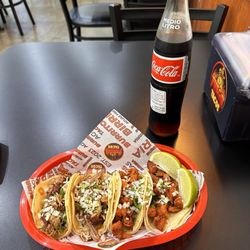 Fuego Tacos - Two carnitas and two barbacoa tacos, and of course a glass bottle Coke!