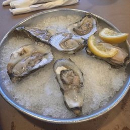 Oysters topped with bleu cheese Oysters topped with bleu cheese