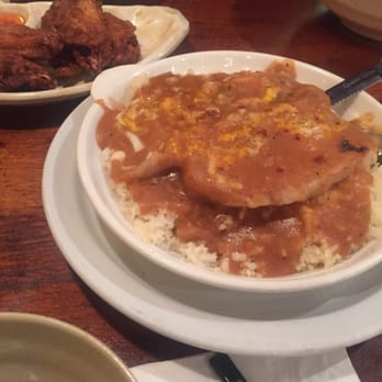 Cousin Cafe - Mini pork chop over rice and a little glimpse of the garlic chicken wings - Chinese Near Me - Newark, California