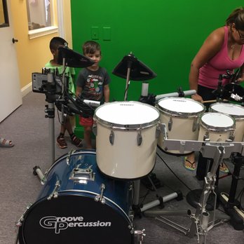Rockatar Music Academy and Studios - Trying out the electric drums - Musical Instruments & Teachers Near Me - Tampa, Florida Rockatar Music Academy and Studios - Trying out the electric drums - Musical Instruments & Teachers Near Me - Tampa, Florida