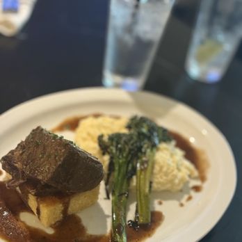 The Charlotte American Bistro - Short ribs & grits. Pic does no justice cornbread under was so good - Bars Near Me - Dallas, Texas The Charlotte American Bistro - Short ribs & grits. Pic does no justice cornbread under was so good - Bars Near Me - Dallas, Texas