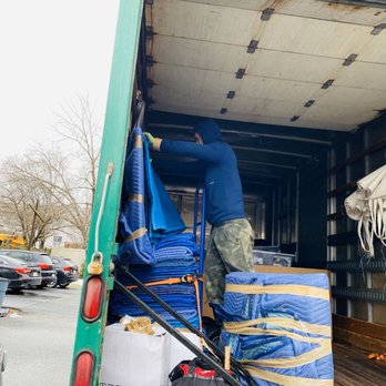 Seven Moving - Delicately tucking in my 55" TV - Movers Near Me - Brookline, Massachusetts
