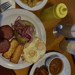 Caffee Colao - Tostones up top, Mangu plate in the center, and bottom is fried chicken plate.