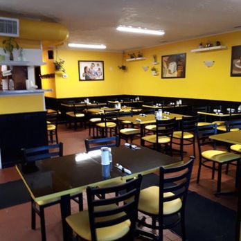 Toast - a dining room with tables and chairs - Breakfast & Brunch Near Me - Cookstown, Ontario
