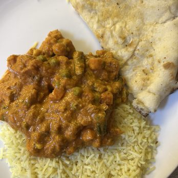 Taj Mahal - Veggie korma with garlic naan - Indian Near Me - Wake Forest, North Carolina