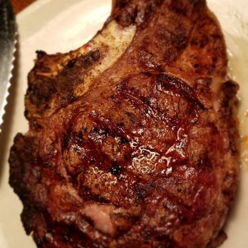 Outback Steakhouse - Bone-in ribeye...perfectly seasoned, juicy and seared texture make it a no brainer reason to return for more! - Steakhouses Near Me - Sunrise, Florida Outback Steakhouse - Bone-in ribeye...perfectly seasoned, juicy and seared texture make it a no brainer reason to return for more! - Steakhouses Near Me - Sunrise, Florida