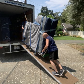 Tom's Piano Moving - Photo 1: Clark and his assistants removing Steinway from their truck - Piano Services Near Me - Concord, California Tom's Piano Moving - Photo 1: Clark and his assistants removing Steinway from their truck - Piano Services Near Me - Concord, California