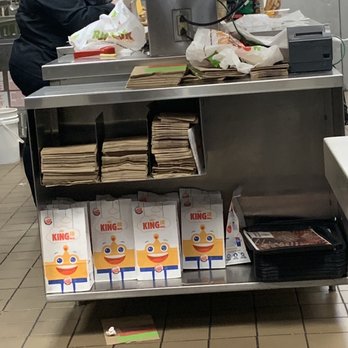 Burger King - a man preparing food in a commercial kitchen - Burgers Near Me - Dilley, Texas