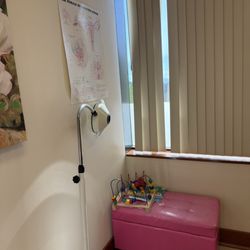 Women's Health of Oregon - Inside of exam room- corner has kids toys which is a nice touch. I have had to bring my kid(s) to an appointment before.