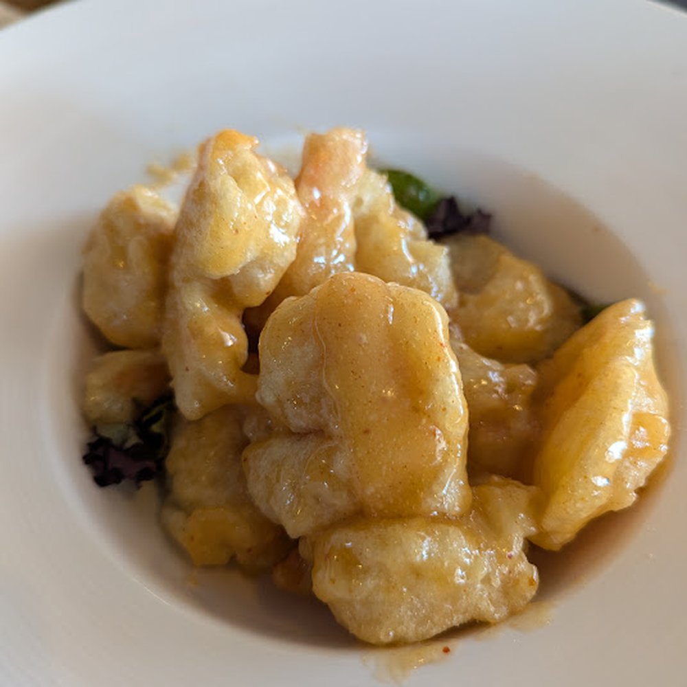 Rock Shrimp Tempura with some sort of sauce. Rock Shrimp Tempura with some sort of sauce.