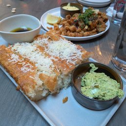 Focaccia Bread, pesto butter, oil and vinegar Fried seafood, calamari, clams shrimp with lemon crema Focaccia Bread, pesto butter, oil and vinegar Fried seafood, calamari, clams shrimp with lemon crema