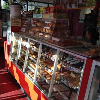 Hole In One Donuts - a display of donuts - Donuts Near Me - Hesperia, California Hole In One Donuts - a display of donuts - Donuts Near Me - Hesperia, California