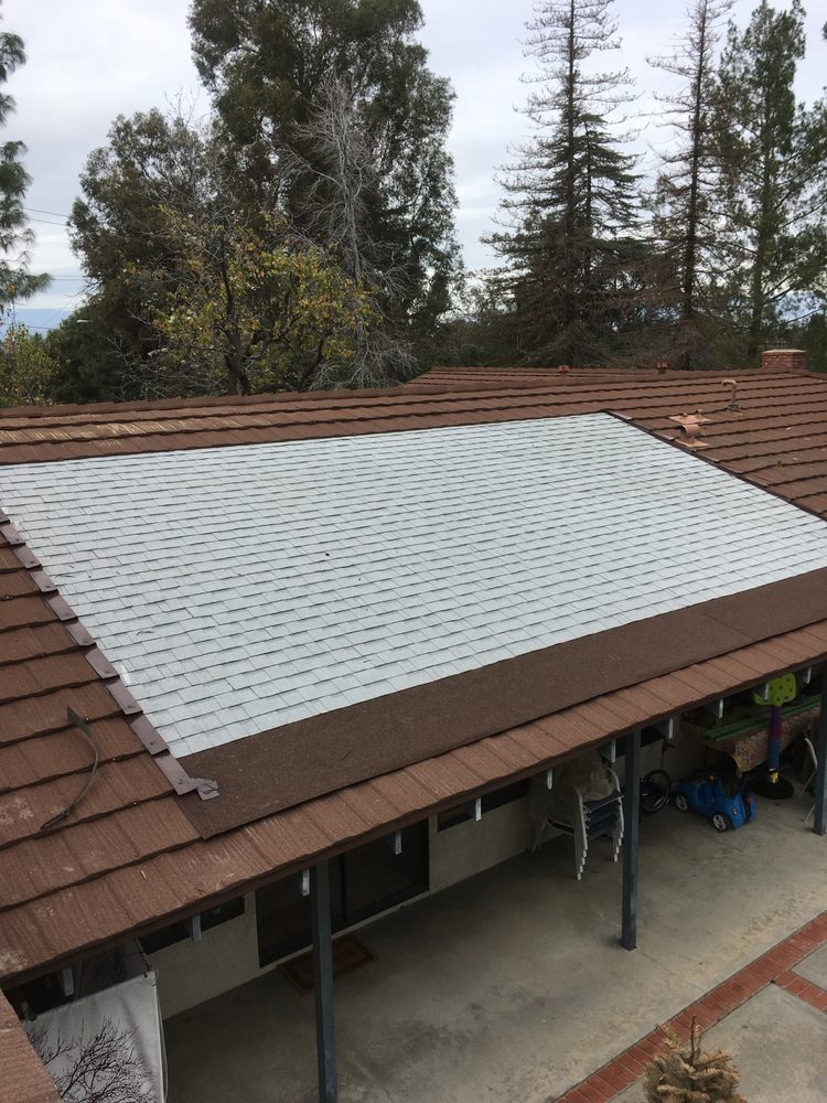 Slide of Lopez Roofing & Construction