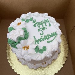 Bloomer Bakery - White cake with raspberry filling and whipped cream frosting.
