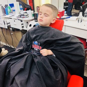 NVP Barber Salon - Fell asleep during his haircut ! His barber , Clauden, gave him his phone with a movie ! (Prior to being done) - Barbers Near Me - Indianapolis, Indiana NVP Barber Salon - Fell asleep during his haircut ! His barber , Clauden, gave him his phone with a movie ! (Prior to being done) - Barbers Near Me - Indianapolis, Indiana
