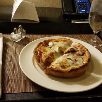 Hilton Rosemont/Chicago O'Hare - Room service, 7" individual deep dish pizza - Hotels Near Me - Rosemont, Illinois Hilton Rosemont/Chicago O'Hare - Room service, 7" individual deep dish pizza - Hotels Near Me - Rosemont, Illinois