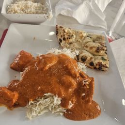 Boneless Butter Chicken and Lamb Masala with garlic Nana bread Boneless Butter Chicken and Lamb Masala with garlic Nana bread
