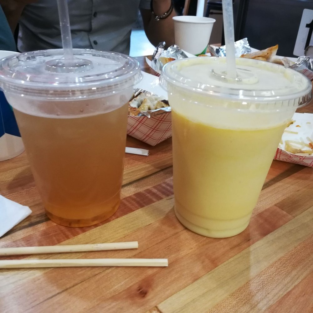 District Dumplings - My Mango + Soymilk blend (right) and a friend's tea (not sure flavor, left)! The mango Soymilk was pretty refreshing and paired well :) - Asian Fusion Near Me - Fairfax, Virginia District Dumplings - My Mango + Soymilk blend (right) and a friend's tea (not sure flavor, left)! The mango Soymilk was pretty refreshing and paired well :) - Asian Fusion Near Me - Fairfax, Virginia