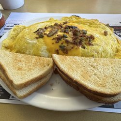 Main Street Cafe - The yooper omelette stuffed with so much goodness