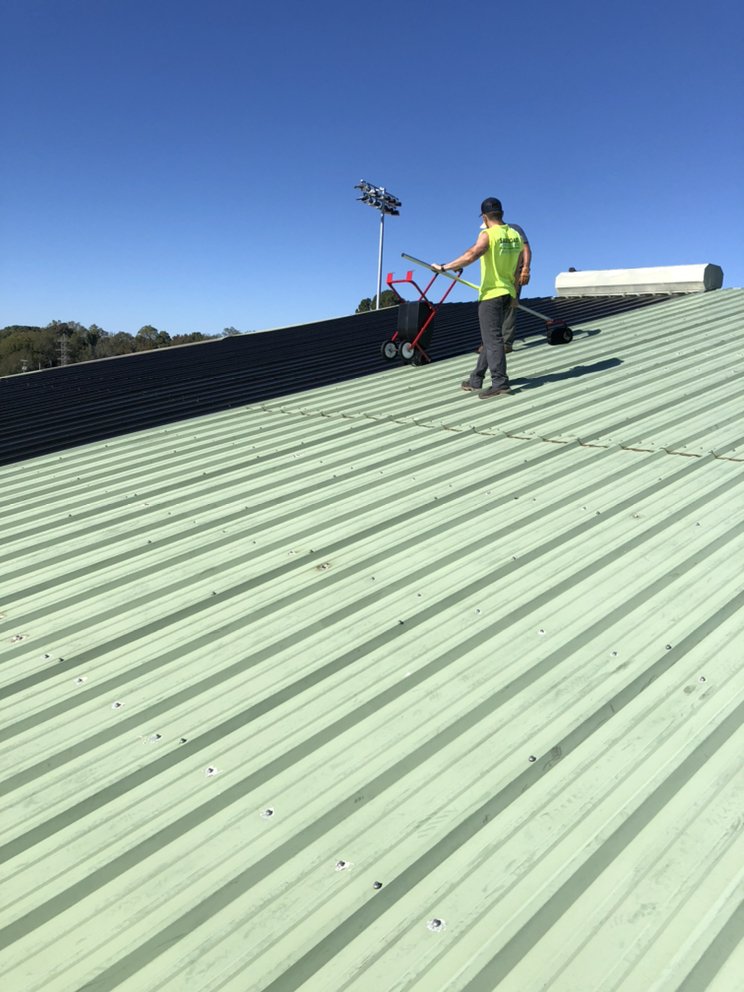 Slide of J&J Commercial Roofing