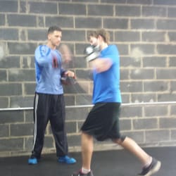 Toned at Home Personal Training - Boxing for Fitness- Jeff with a right uppercut.