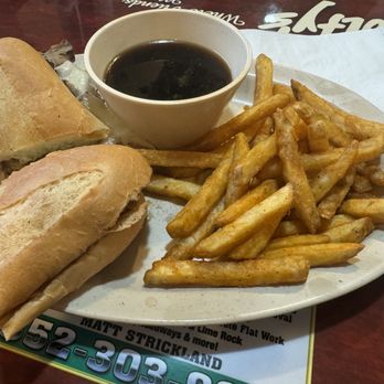 Wolfy’s Leesburg Restaurant - French Dip with Swiss cheese and au jus with french fries - New American Near Me - Leesburg, Florida