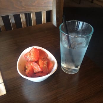 Chalice - Tomato salad side comes with the meal - New American Near Me - Oshkosh, Wisconsin