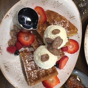 Cedar + Stone, Urban Table - C+ S waffles with cream fraiche, berries, and candied pecans! - New American Near Me - Bloomington, Minnesota