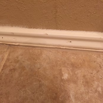 Empire Today - Grout all over my tile. (It blends a little. Have to look closely.) - Flooring Near Me