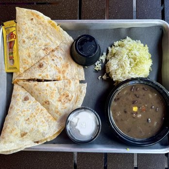 Escudo's Bar & Grill - "Tripletta Quesadilla" (flour tortilla filled with cheese, shredded beef, pulled pork, bacon crumbles and buzz sauce) - Cocktail Bars Near Me - Orlando, Florida Escudo's Bar & Grill - "Tripletta Quesadilla" (flour tortilla filled with cheese, shredded beef, pulled pork, bacon crumbles and buzz sauce) - Cocktail Bars Near Me - Orlando, Florida