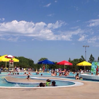 Pelican Bay Aquatic Center - A lazy river offshoot of the pool. You can also see the climbing wall in the back right corner of the photo. - Swimming Pools Near Me - Edmond, Oklahoma Pelican Bay Aquatic Center - A lazy river offshoot of the pool. You can also see the climbing wall in the back right corner of the photo. - Swimming Pools Near Me - Edmond, Oklahoma