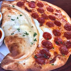 Amano - The Pizza Pie-Zoni , the best of everything. If pizza and calzone had a baby.....