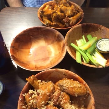 Wings Plus - Catskill mountain garlic wings with medium in front. Key west in the back!! So good - Chicken Wings Near Me - Fort Lauderdale, Florida