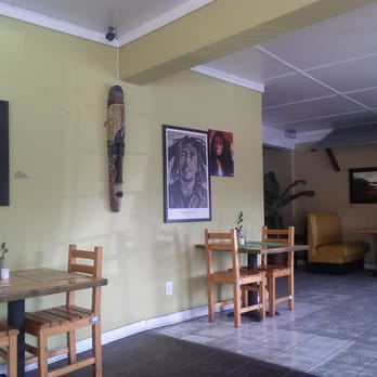 Nice Mon Restaurant - Inside. A nice Bob Marley pic - Caribbean Near Me - Stone Mountain, Georgia