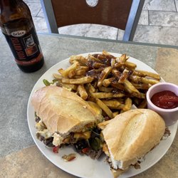 Sam's Hoagies - Philly cheese steak with crispy golden fries with home made gravy made from scratch. Finish it off with a ginger beer @Sam's Hoagies