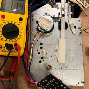 Rasmussen Turntable Repair - Measuring voltage across a board prior to installation of an internal preamp. - Electronics Repair Near Me Rasmussen Turntable Repair - Measuring voltage across a board prior to installation of an internal preamp. - Electronics Repair Near Me