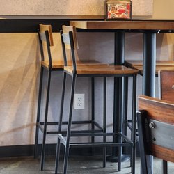 MOD Pizza - Table with outlet underneath,