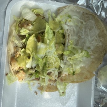 Tacos El Ranchero - a chicken taco with lettuce and cheese - Food Trucks Near Me - Houston, Texas Tacos El Ranchero - a chicken taco with lettuce and cheese - Food Trucks Near Me - Houston, Texas