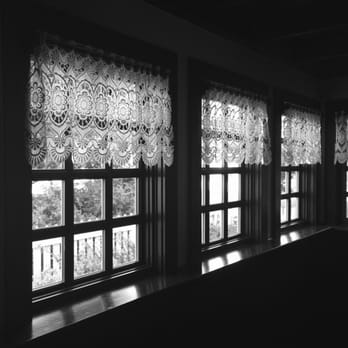 Renaissance Cafe - Windows and lace curtains in the cafe - Italian Near Me - Assaria, Kansas