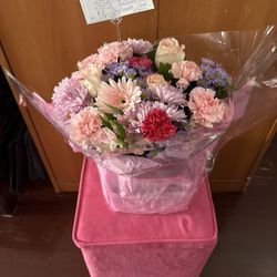 Larry's Florist - Floral bouquet in pink-lavendar hues.