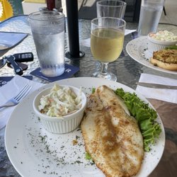 Chesapeake House - Baked fish with garlic butter sauce