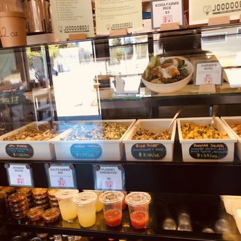 Joodooboo - Display with banchan, noodles, bowls - Korean Near Me - Oakland, California