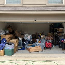 Full frontal view - YOU ARE NOT ALONE! Probably 90% of the garages in SA could use a good purge!