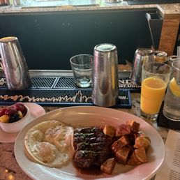 Steak and eggs at brunch w/ fresh fruit! Steak and eggs at brunch w/ fresh fruit!