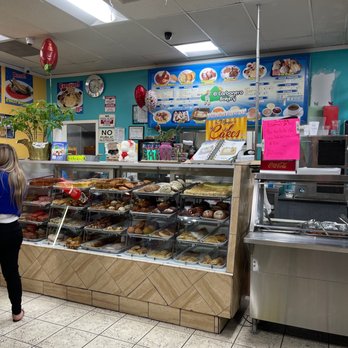 El Carbonero Bakery - a woman standing in front of a deli counter - Bakeries Near Me - Panorama City, California El Carbonero Bakery - a woman standing in front of a deli counter - Bakeries Near Me - Panorama City, California
