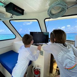 Captain Blacks Fishing - Family fishing trip on Captain Black's. The girls watching manatees on the fish finder.