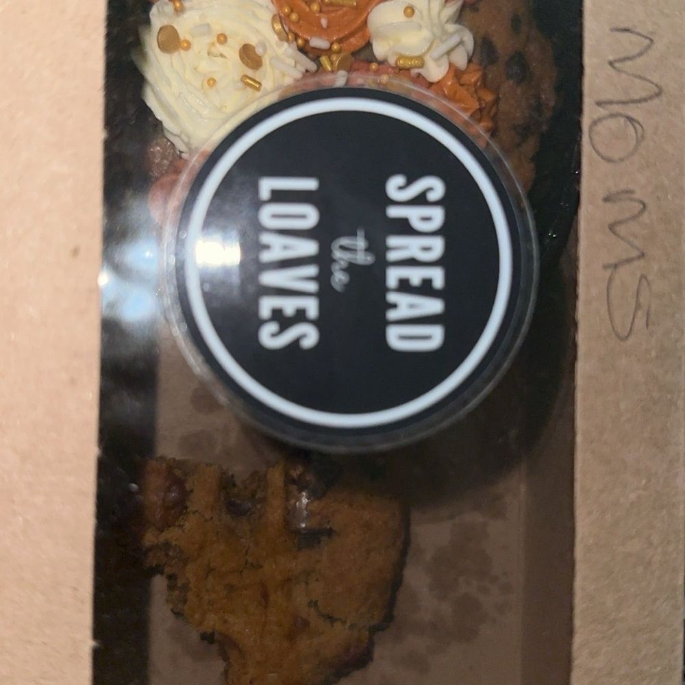 Spread the Loaves - What's left of my pumpkin chocolate chip cookie and the chocolate chip cookie with frosting - Bakeries Near Me - Helotes, Texas Spread the Loaves - What's left of my pumpkin chocolate chip cookie and the chocolate chip cookie with frosting - Bakeries Near Me - Helotes, Texas