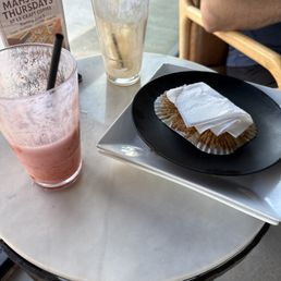 Strawberry banana smoothie, plates from 2 sandwiches and a banana bread, nitro cold brew (finished)